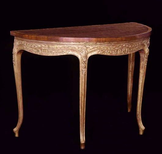 Picture of GEORGE III STYLE MAHOGANY AND GILTWOOD DEMI-LUNE TABLE